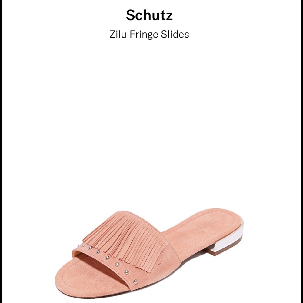 Schutz NWT slide sandals with fringe and studs.